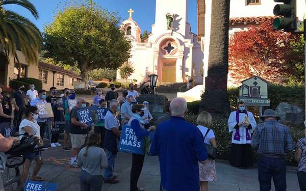 California Catholics pray, protest at destroyed St. Junipero Serra statue