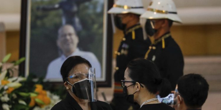 Aquino, Philippine ex-leader who challenged China, is buried