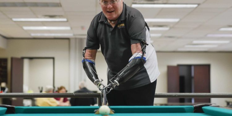 Prosthetic pool player racks up points, pals in Conroe