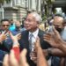 Malaysian ex-PM’s jail term halved to six years