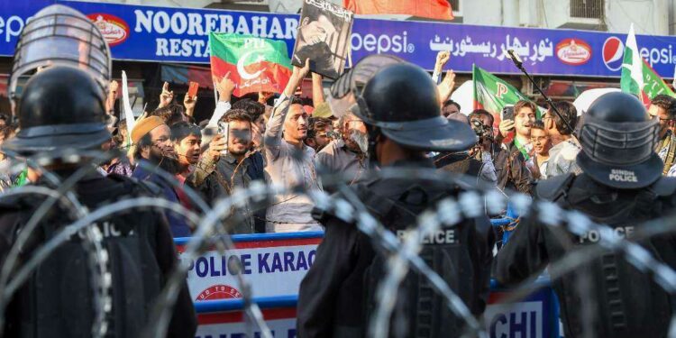 Pakistan police clash with Khan supporters at poll protests