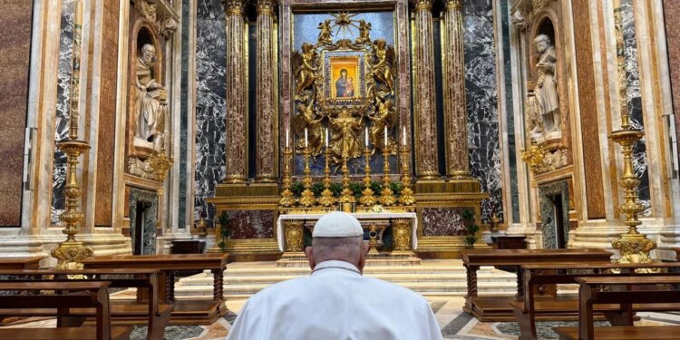 Pope Francis prays at Santa Maria Maggiore basilica ahead of Holy Week celebrations