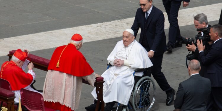 Pope Francis greets pilgrims at Palm Sunday Mass