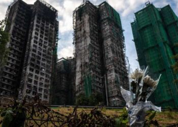 Hong Kong fire death toll hits 159, mourners demand truth