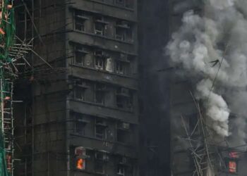 HK told to stop suppressing critics after deadly apartment blaze