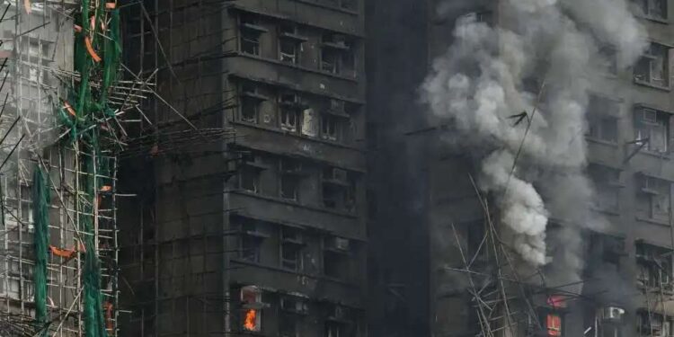 HK told to stop suppressing critics after deadly apartment blaze
