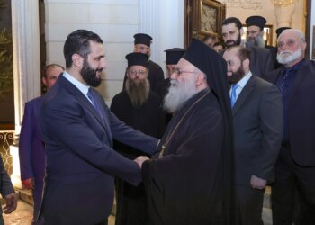 Syrian transitional president visits Greek Orthodox Patriarch John X Yazigi in Damascus